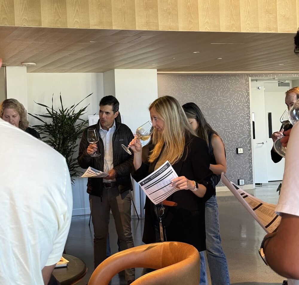 Guests tasting white wine during a guided tasting